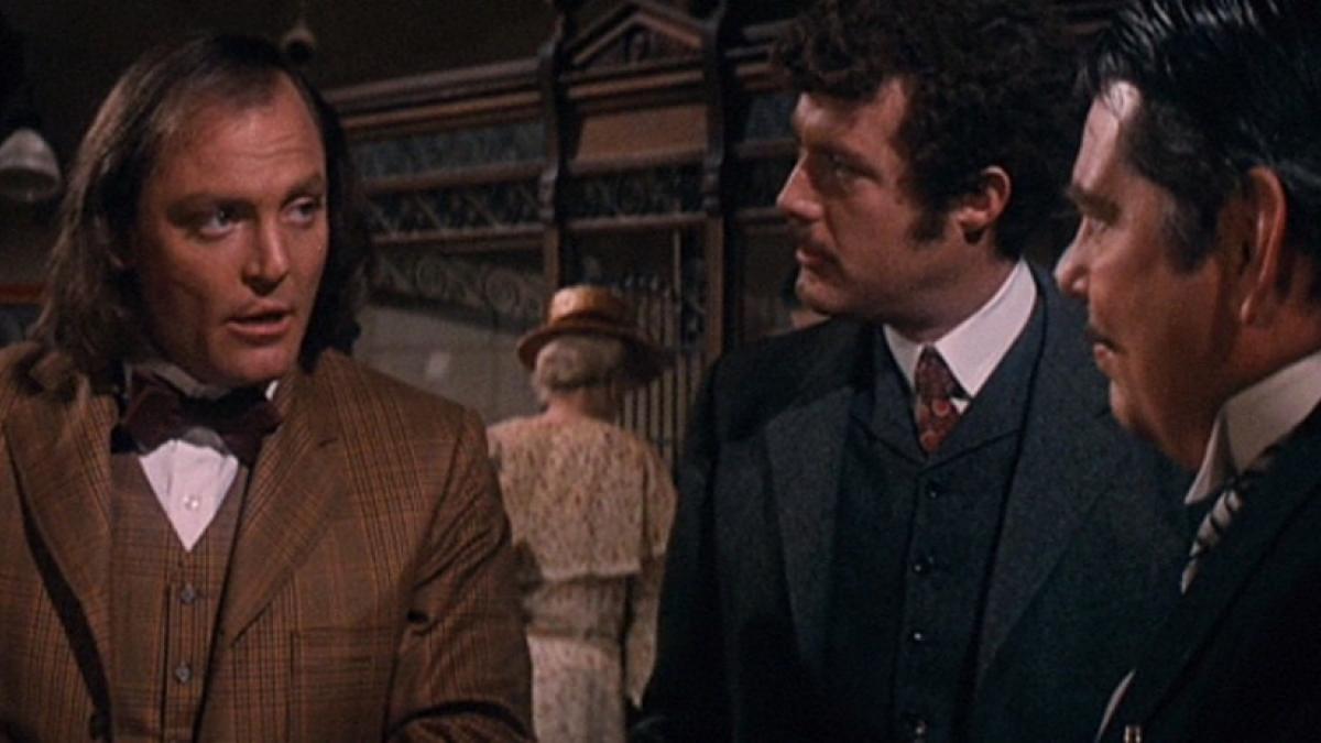 Stacy Keach (left) is an iternerant executioner who falls for one of his "clients" in  Jack Smight's 'The Traveling Executioner'. 