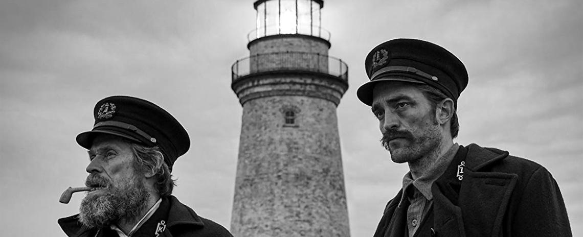 Wake (Willem Dafoe, left) and Winslow (Robert Pattinson) are lonely keepers of the flame in Robert Eggers' The Lighthouse.