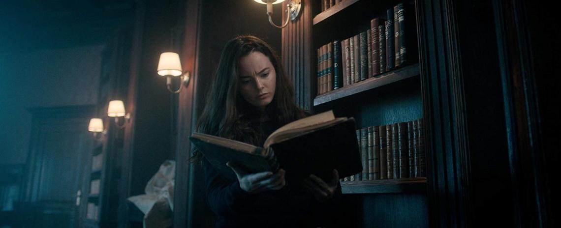 Violinist Rose Fisher (Freya Tingley) peruses one of her late father's books while searching for answers in Andrew Desmond's 'The Sonata'.
