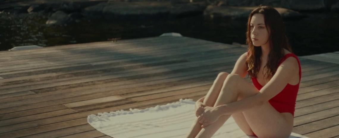 Aubrey Plaza is a filmmaker whose attempt at a creative retreat turns weird in Lawrence Michael Levine's 'Black Bear'. 